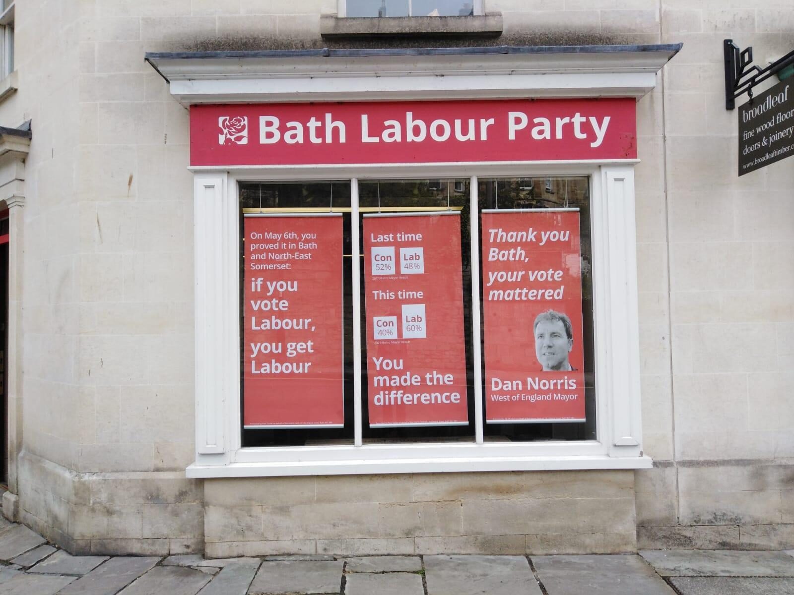 Our Walcot St office with Dan Norris posters that say: "Vote Labour, Get Labour"