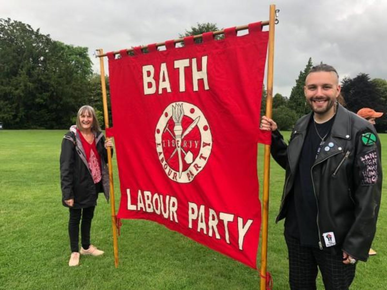 Members hold a Bath Labour banner at the rally